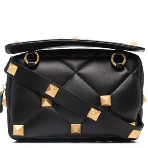 Valentino Garavani
Roman Stud diamond-quilted clutch/cross body bag Lamb Skin